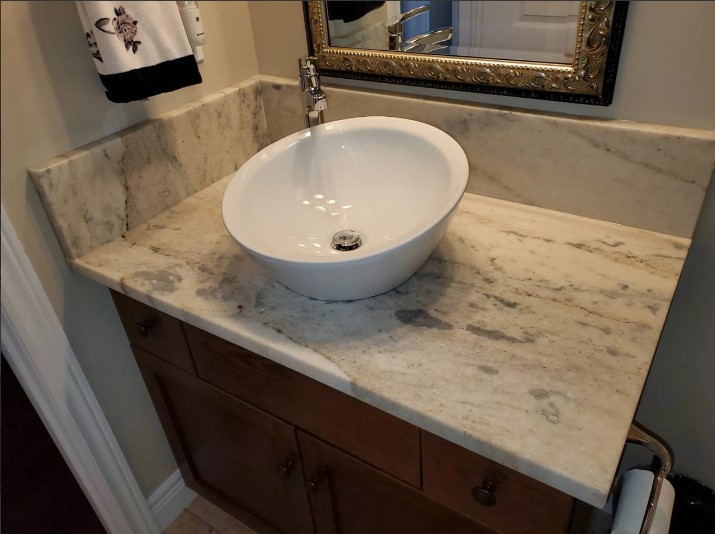 Custom granite countertop installed in a bathroom vanity