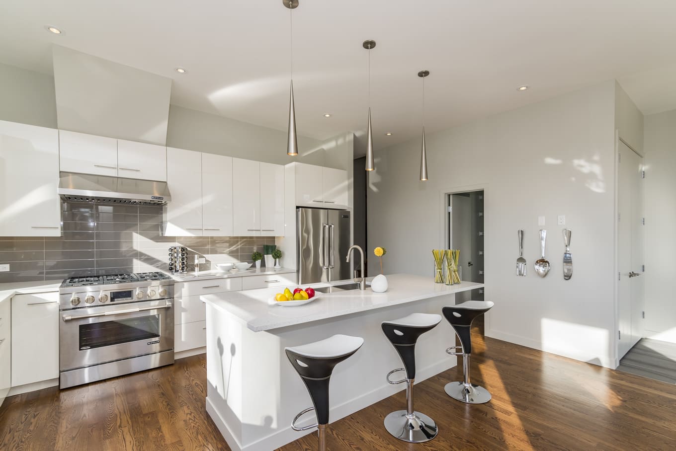 Modern kitchen featuring newly installed stone countertops