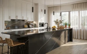 Black quartz countertops with white cabinets and waterfall island in a modern luxury kitchen