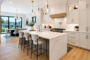 Kitchen countertops Guelph featuring modern white quartz waterfall island
