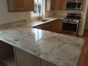 Local countertop installers completing a modern kitchen countertop renovation with quartz surfaces